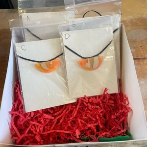 Handmade half cut clementine shaped resin necklaces